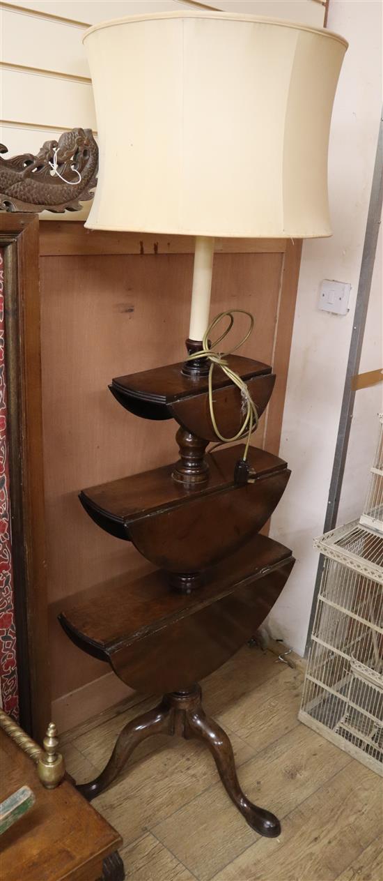 A George III mahogany dumb waiter adapted as a standard lamp W.60cm